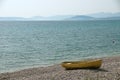 Lonely yellow boat at the seaside