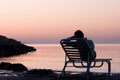 Lonely young woman near the ocean