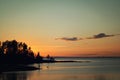 Lonesome fisherman on the bank. Ladoga lake. Royalty Free Stock Photo