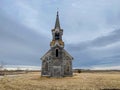 A long abandoned church still stands on the quiet prairie Royalty Free Stock Photo