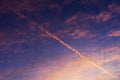 Airplane trail in morning time Royalty Free Stock Photo