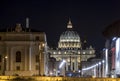 The long avenue of the Vatican with St. Peter`s Basilica in the background at night