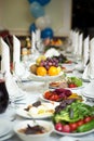 Long banquet table with fruits. Indoor Royalty Free Stock Photo