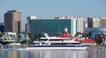 Long Beach, California, U.S.A - November 12, 2022 - Catalina Express boat with the background of the buildings in the city along Royalty Free Stock Photo