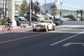 Long Beach, California USA - April 12, 2021: antique beige vintage car cabriolet front side view.