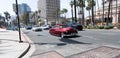 Long Beach, California USA - April 11, 2021: red chevrolet kustom retro car crossing road. luxury Royalty Free Stock Photo