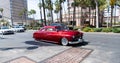 Long Beach, California USA - April 11, 2021: red chevrolet kustom famous retro car left side view Royalty Free Stock Photo