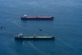 Aerial view of two Freighters anchored off the coast of Long Beach