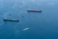 Aerial view of two Freighters anchored off the coast of Long Beach