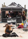 Long Beach, New York - September 13, 2018 : Unsound Pro photographer on the beach near an the event tent. Royalty Free Stock Photo