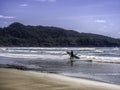 Long Beach Surfer on Vancouver Island, BC, Canada Royalty Free Stock Photo