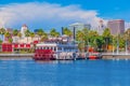 Long Beach waterfront with skyline, Rainbow Harbor and paddleboa,t CA Royalty Free Stock Photo