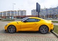 Big elegant modern yellow sport car Toyota Supra coupe left side view