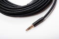 Long black RCA 3.5 to 2RCA splitter jack cable Royalty Free Stock Photo