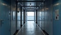 Long Blue Hallway Leading to Sea with Bright Light Royalty Free Stock Photo