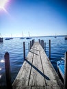 Long boat bridge at the lake Royalty Free Stock Photo