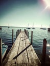 Long boat bridge at the lake Royalty Free Stock Photo