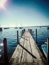 Long boat bridge at the lake Royalty Free Stock Photo