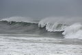 Long breaking wave with spray Royalty Free Stock Photo