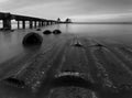 The long bridge over the sea with a beautiful sunrise in black a Royalty Free Stock Photo