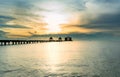 The long bridge over the sea with a beautiful sunrise. Royalty Free Stock Photo