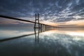 Long bridge over tagus river in Lisbon at dawn Royalty Free Stock Photo