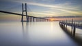 Long bridge over tagus river in Lisbon at sunrise Royalty Free Stock Photo