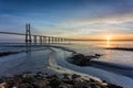 Long bridge over tagus river in Lisbon at sunrise Royalty Free Stock Photo