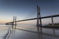 Long bridge over tagus river in Lisbon at sunrise Royalty Free Stock Photo