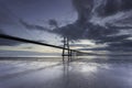 Long bridge over tagus river in Lisbon at sunrise Royalty Free Stock Photo