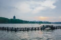 Long Bridge over West Lake with Leifeng Pagoda on hills under sunset in the distance, in Hangzhou, China Royalty Free Stock Photo