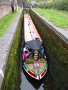 Long canal narrowboat inside lock Royalty Free Stock Photo