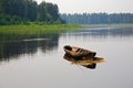 A long wooden boat of Siberian Mansi people Royalty Free Stock Photo