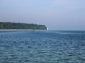 Long Coastline with Forest Beach and Light Tower