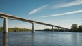 Long Concrete Bridge Over River with Blue Sky. Royalty Free Stock Photo