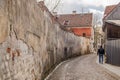 Long concrete wall in Kuldiga old town, Latvia