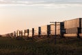 Long Container Train at Sunrise on Canadian Prairie