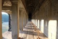 A long corridor with a colonnade. Old, abandoned building of the Khmer Empire