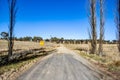 Long country road through a rural field near Emmaville, New South Wales, Australia