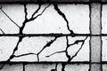 Long crack on the grey grunge cement wall. Abstract damaged wall texture with traces of destruction from old age and Royalty Free Stock Photo