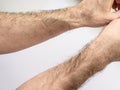 long hair on male hands - a symptom of increased testosterone in men