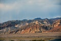 Long desert highway leading into Death Valley National Park Royalty Free Stock Photo