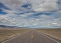 Long Desolate Road in the Desert Royalty Free Stock Photo