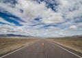 Long Desolate Road in the Desert Royalty Free Stock Photo