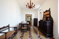 Long dining room in apartment interior in old country house