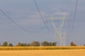 High voltage pylons against the background of blue sky