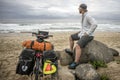 Long Distnace Cyclist with Bicycle on Beach Royalty Free Stock Photo