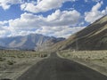 Long drive, sky and mountains