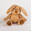 Long ears plush rabbit sitting