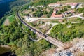 Long empty freight train passing near hospital Royalty Free Stock Photo